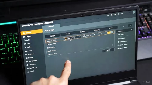 Bildschirm eines Gigabyte Aorus Laptops zeigt das Control Center Menü wo ein Finger die dedizierte GPU über den MUX Switch aktiviert.